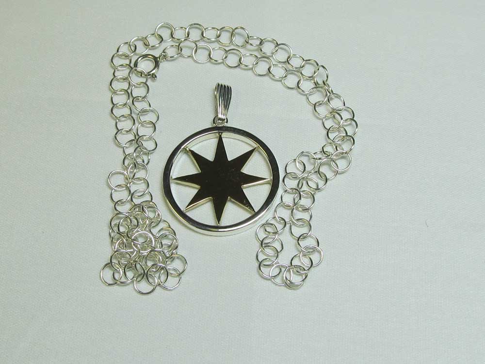 The Star - Sterling Silver pendant with 14K Star sign